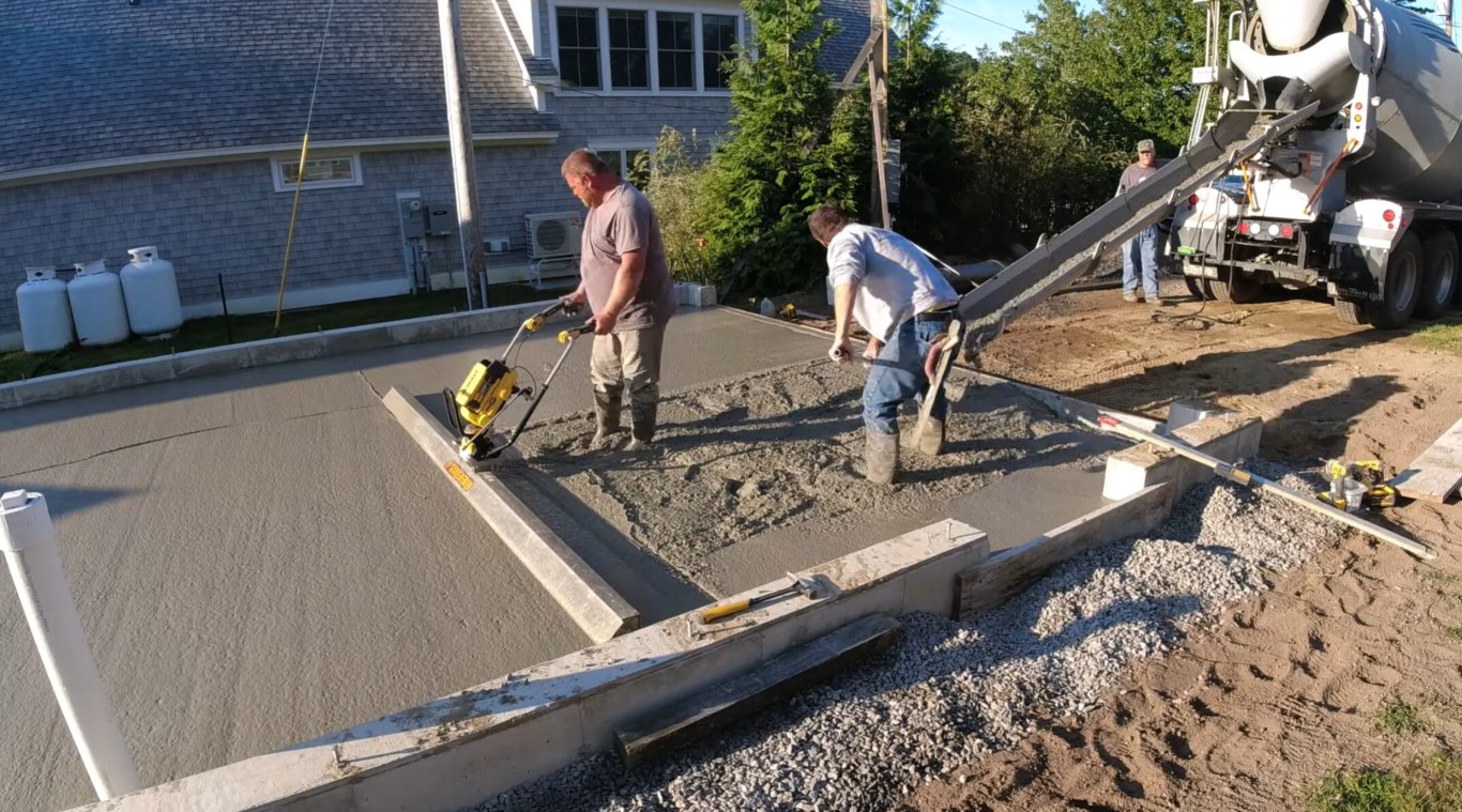 Professional concrete contractors ensuring proper grading and base work in Upland, CA